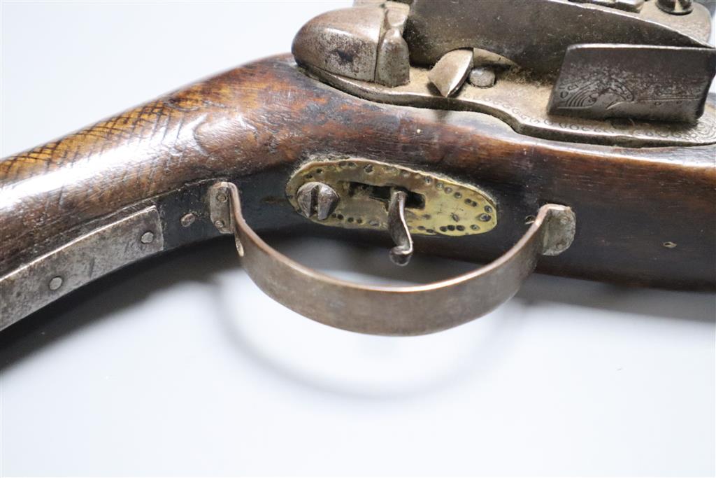 A late 18th century flintlock holster pistol, with walnut stock, 37cm long